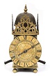 An early French Louis XIV brass lantern timepiece, Rousseau A Lyon, circa 1665